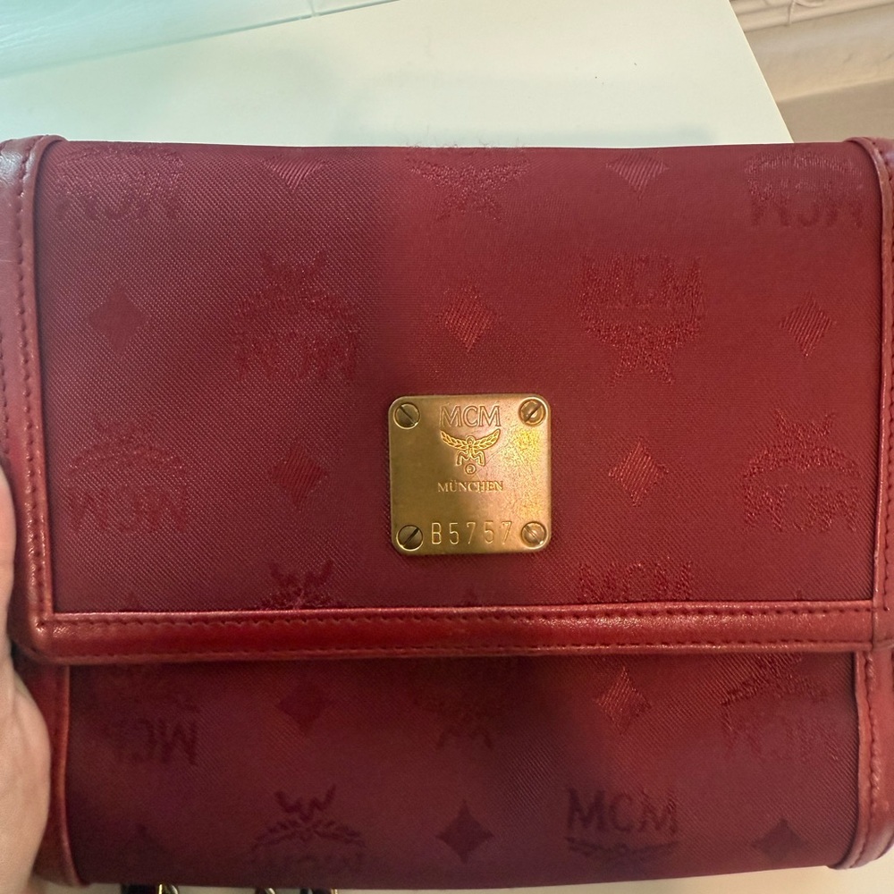 MCM Burgundy Crossbody Bag with Gold Accents